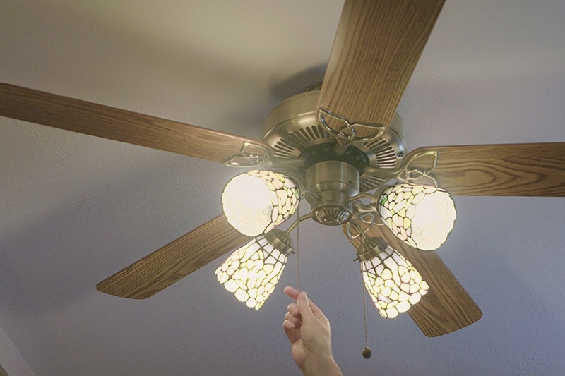 Video - Energy Saving Tip 2. Person turning on ceiling fan.